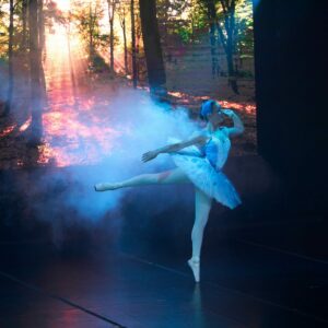 Ballerina in Costume Performing On Stage