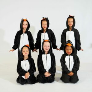 Young Ballerinas In Penguin Costumes