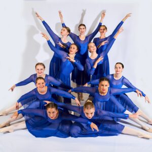 Teenage Ballerinas In Blue Dresses