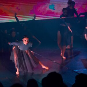 Ballerinas in Black Costume Performing On Stage