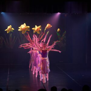 Teenage Ballerinas in Flower Dresses Performing On Stage