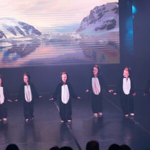Ballerinas in Penguin Costumes Performing On Stage