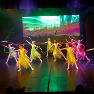 Young Ballerinas Performing On Stage