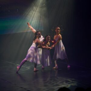 Young Ballerinas Performing On Stage