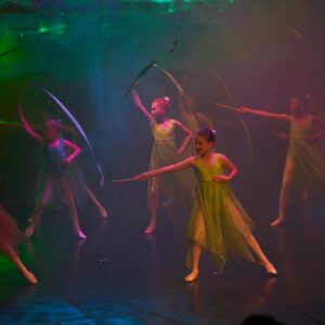 Young Ballerinas Performing On Stage