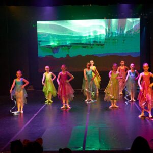 Young Ballerinas Performing On Stage