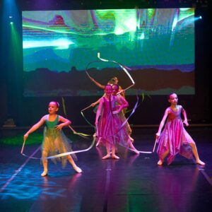 Young Ballerinas Performing On Stage